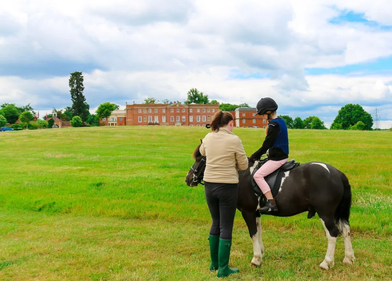 Kids can "own a pony" at Four Seasons Hotel Hampshire, England. The luxury hotel has an onsite equestrian centre with 14 horses.