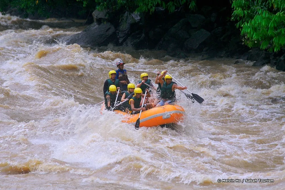 Go white water rafting on the kiulu river when visiting Kota Kinabalu with kids.