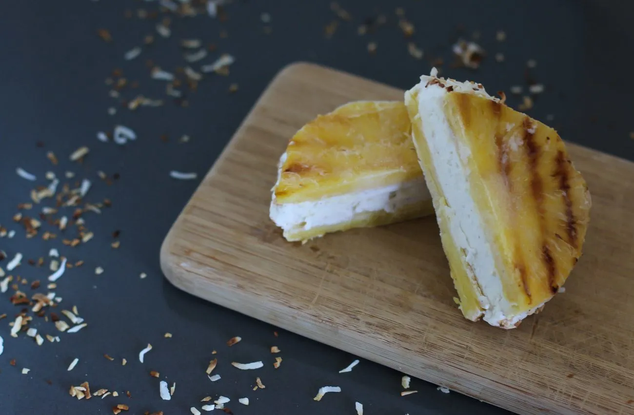 A recipe for a tropical ice cream sandwich using toasted coconut, Breyers ice cream and pineapple