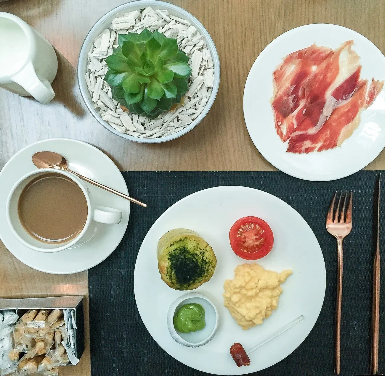 Plankton butter, plankton brioche, Iberian ham, eggs and a skewer of fish sausage for breakfast at Mandarin Oriental, Barcelona's BistrEau restaurant