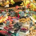 A fruit and vegetable stand at La Boqueria Market in Barcelona