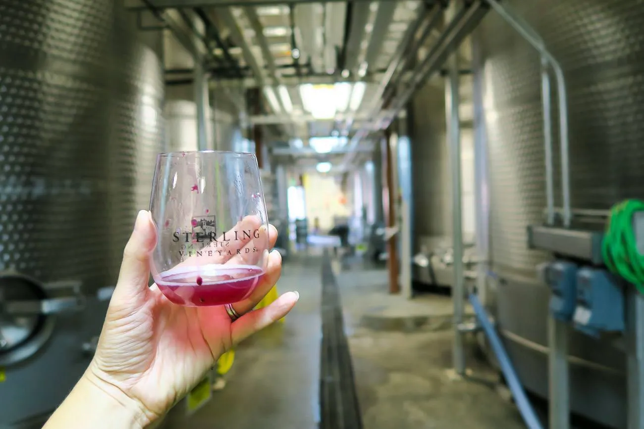Tasting a young Rose wine behind-the-scenes at Sterling Vineyards in Napa Valley