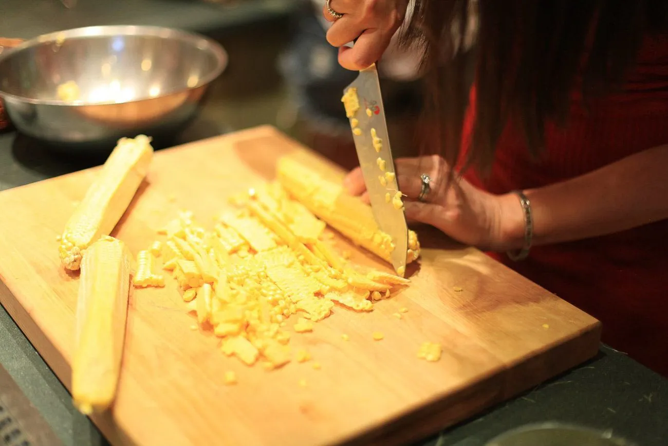 Chef Joey Altman taught us that you cut corn off the cob with the cob horizontal... it's so much easier!!!