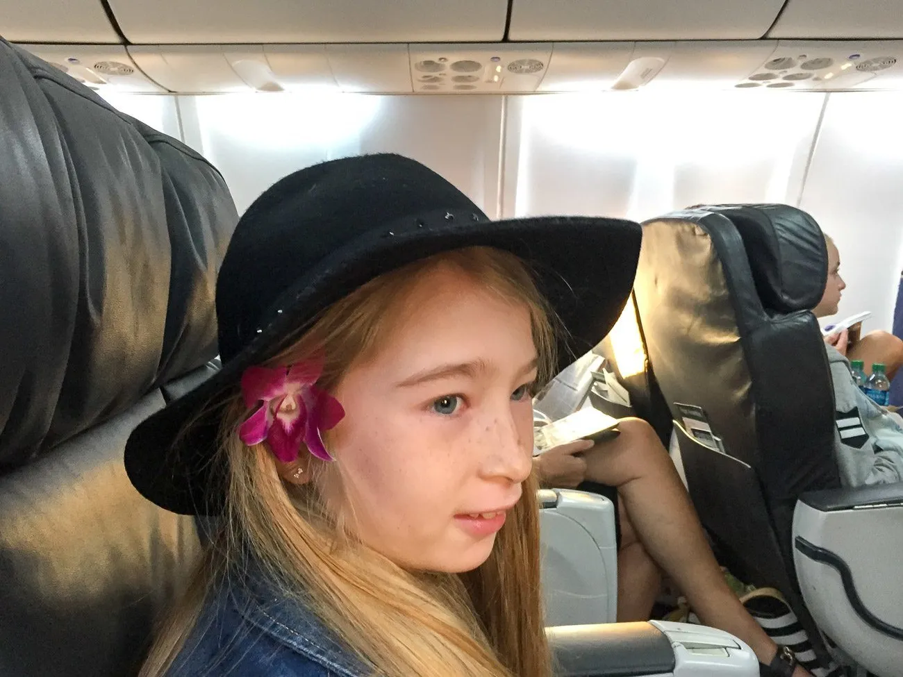 The Alaska Airlines flight attendants placed flowers in the ears of children on board before take-off.