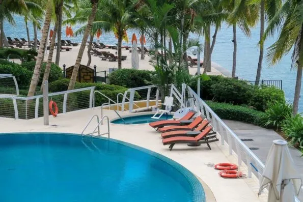 Private beach and swimming pool at Mandarin Oriental, Miami which is steps from Biscayne Bay.