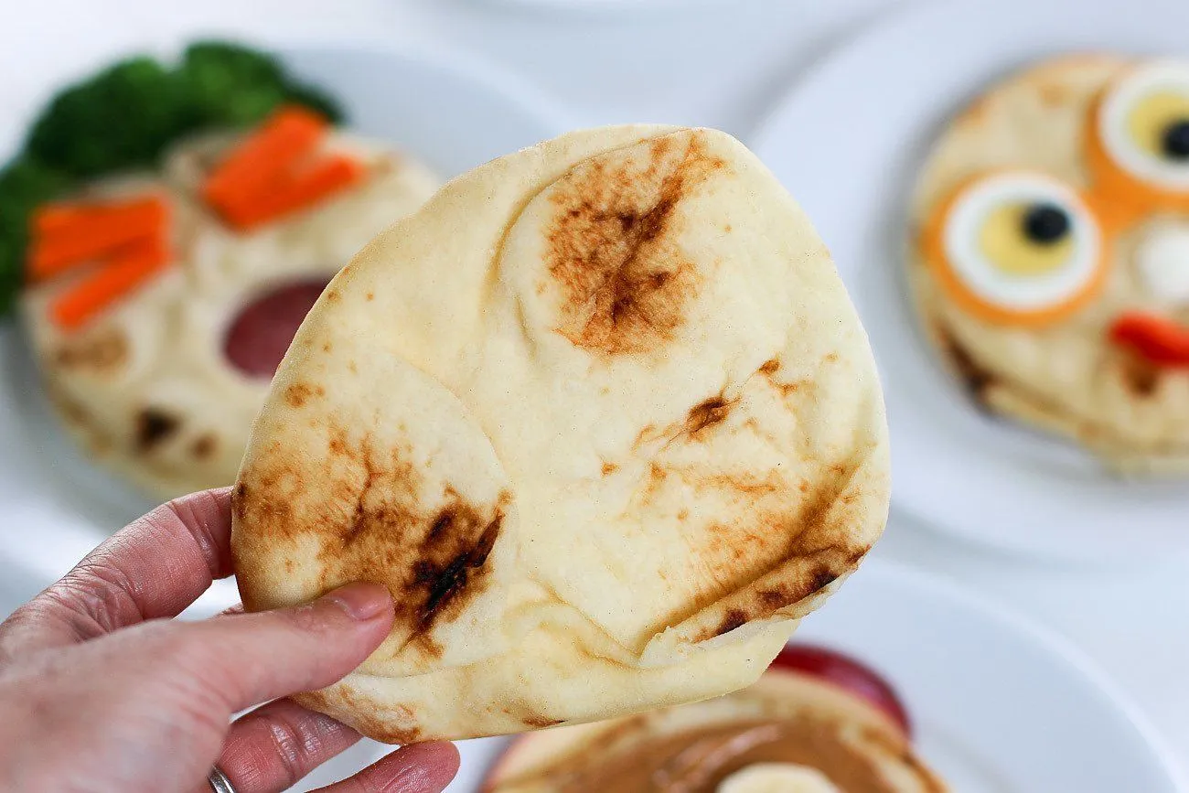 The bubbled side of naan bread.
