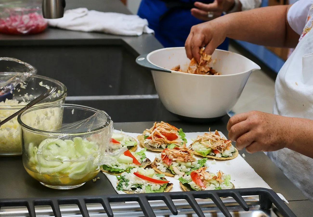 Chipotle chicken is one of the panucho topppings