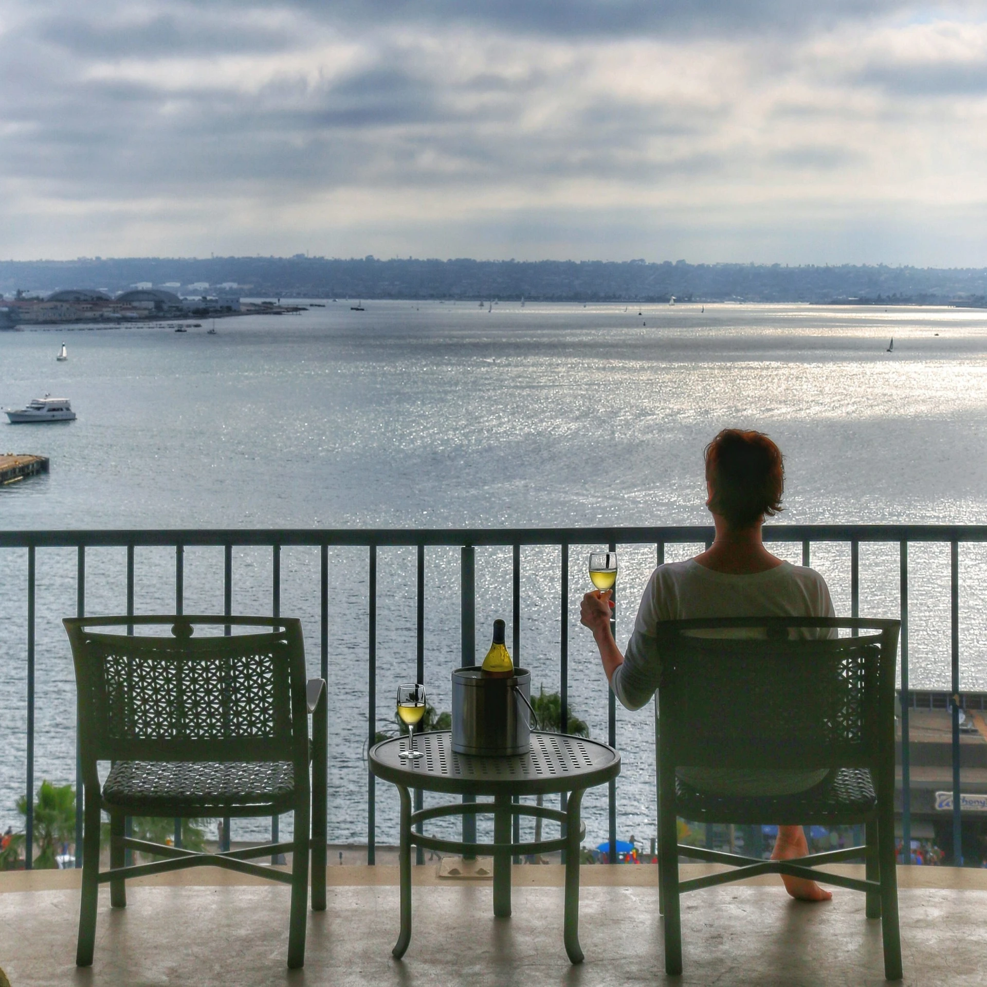 Sunset on the balcony overlooking the water at Wyndham San Diego Bayside