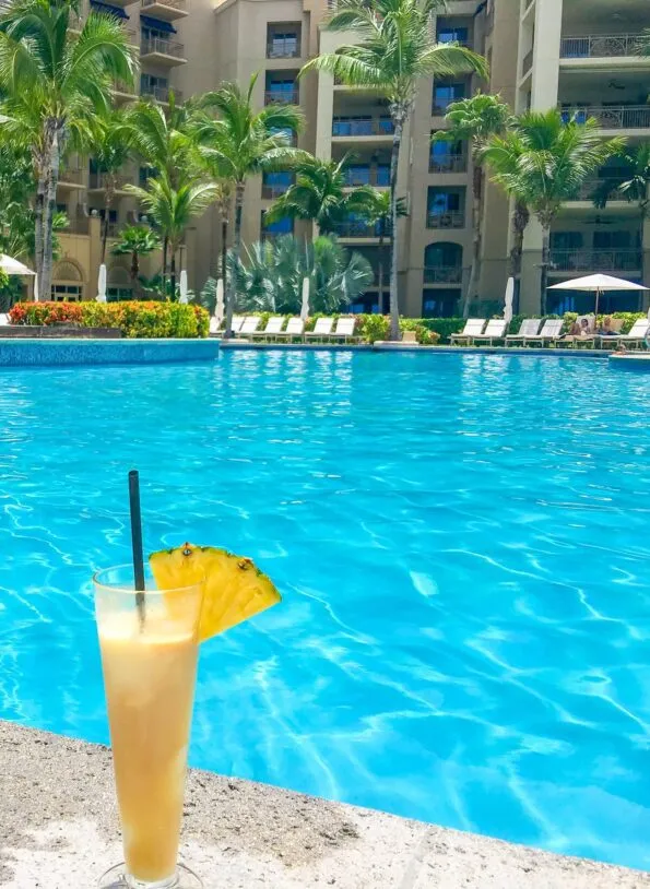 A pi&agrave;&plusmn;a colada at The Ritz-Carlton Grand Cayman pool