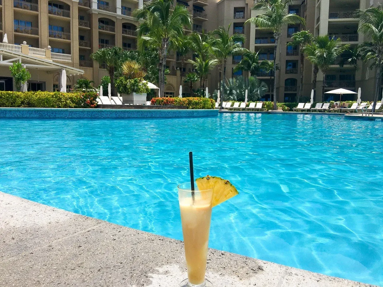 A pi&agrave;&plusmn;a colada at The Ritz-Carlton Grand Cayman pool