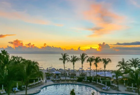 Sunset over Seven Mile Beach from an ocean front room at The Ritz-Carlton, Grand Cayman.