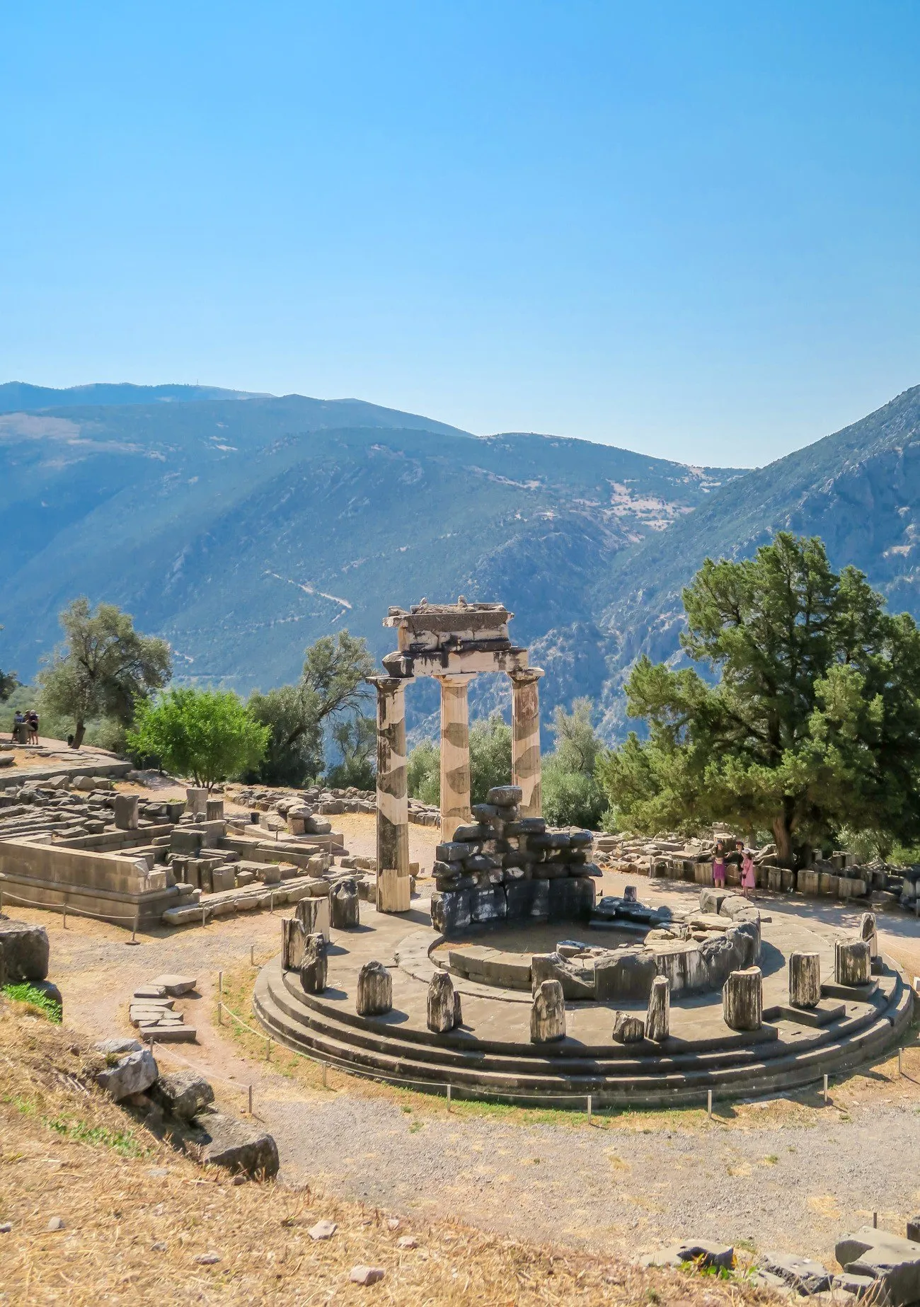 A view looking down on the sanctuary of Athena Pronaia at Delphi in Greece.