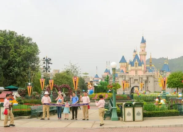 Get to Hong Kong Disneyland a few minutes before it opens to see the opening ceremony, pictured here.