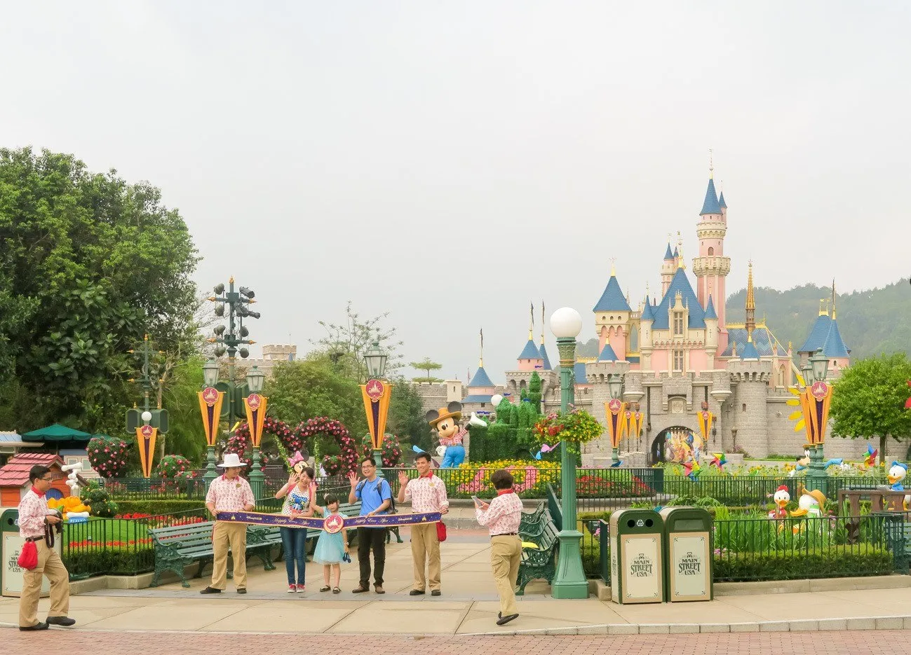 Get to Hong Kong Disneyland a few minutes before it opens to see the opening ceremony, pictured here.