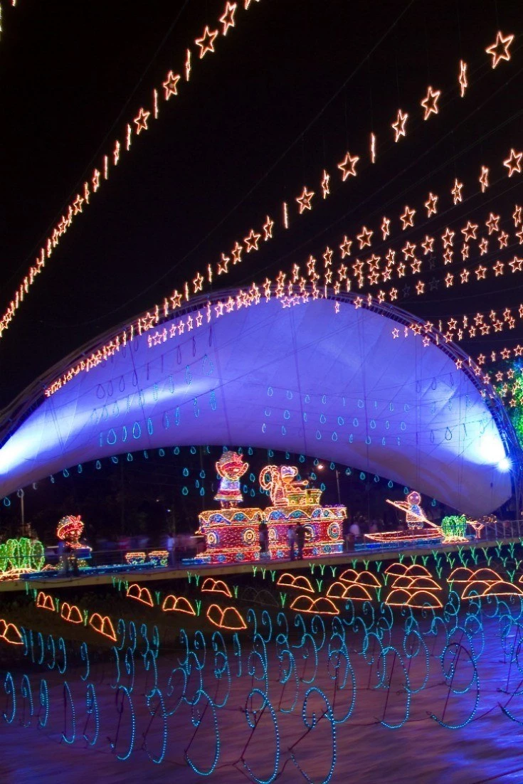 Christmas lights in Medellin over the river.