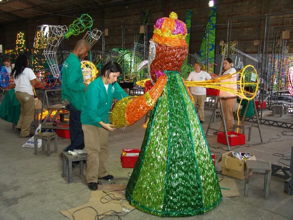 Putting together some of the 31 million Christmas lights of Medellin.