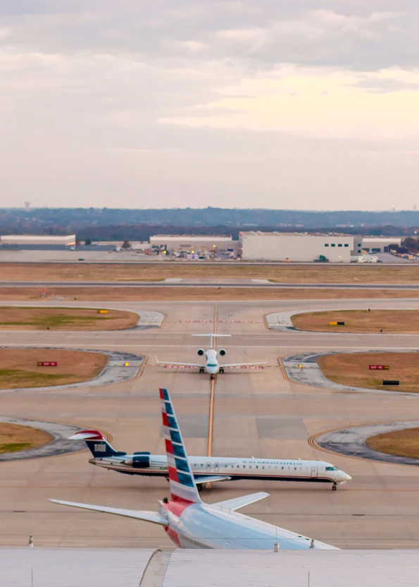 Planes as seen from a runway room at Grand Hyatt DFW, a great Dallas airport hotel.