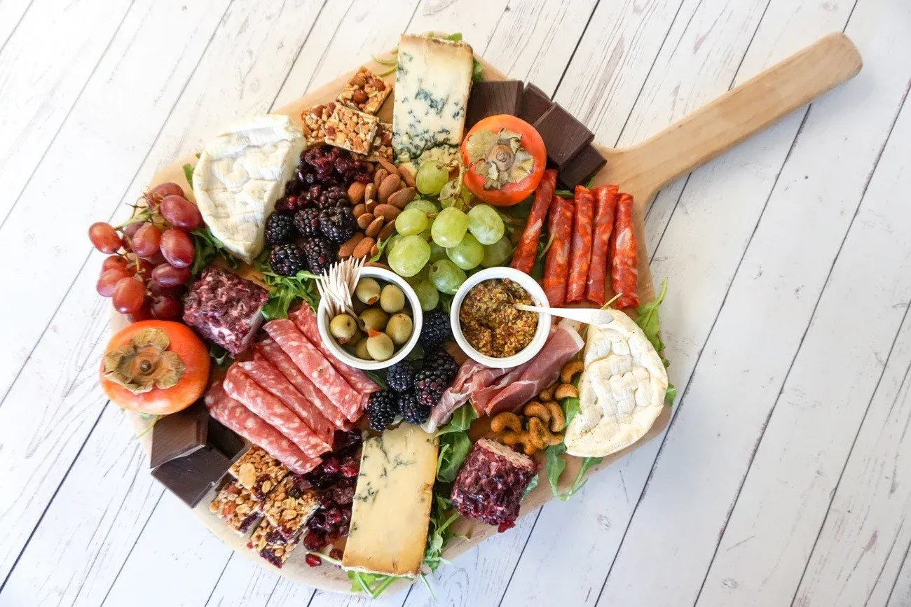 Make a prettier charcuterie and cheese board that gives your guests more choices with these tips.