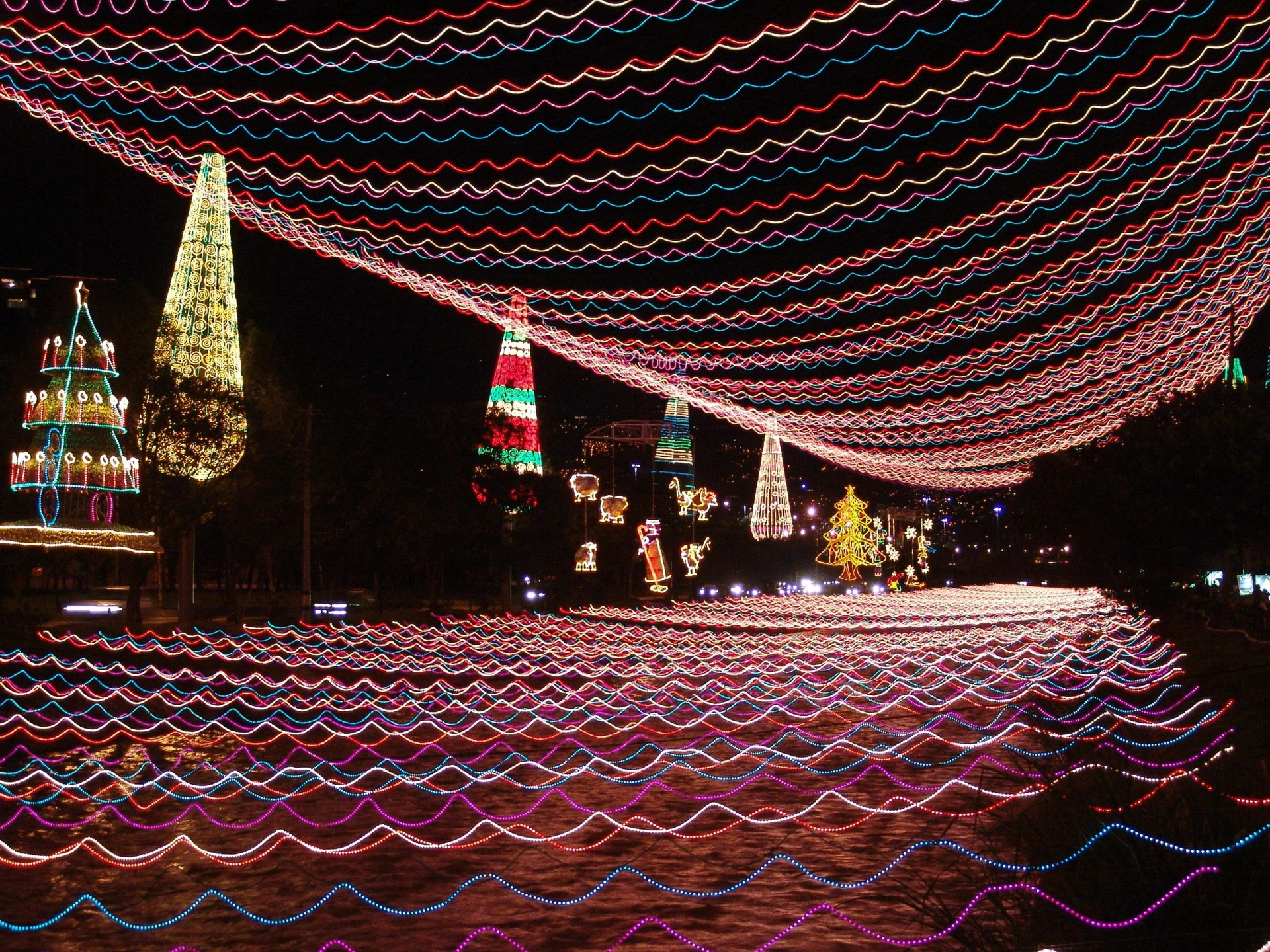 Christmas lights in Medell&iacute;n over the river