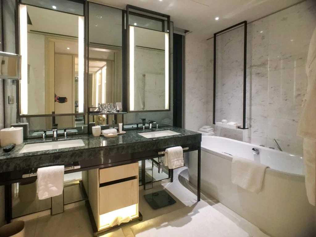 Huge white marble bathroom at Four Seasons Hotel Seoul.