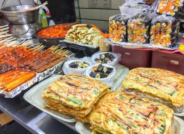 A street food vendor sells gimbap, Korean pancakes, mandu and more in Seoul's Myeongdong neighborhood.