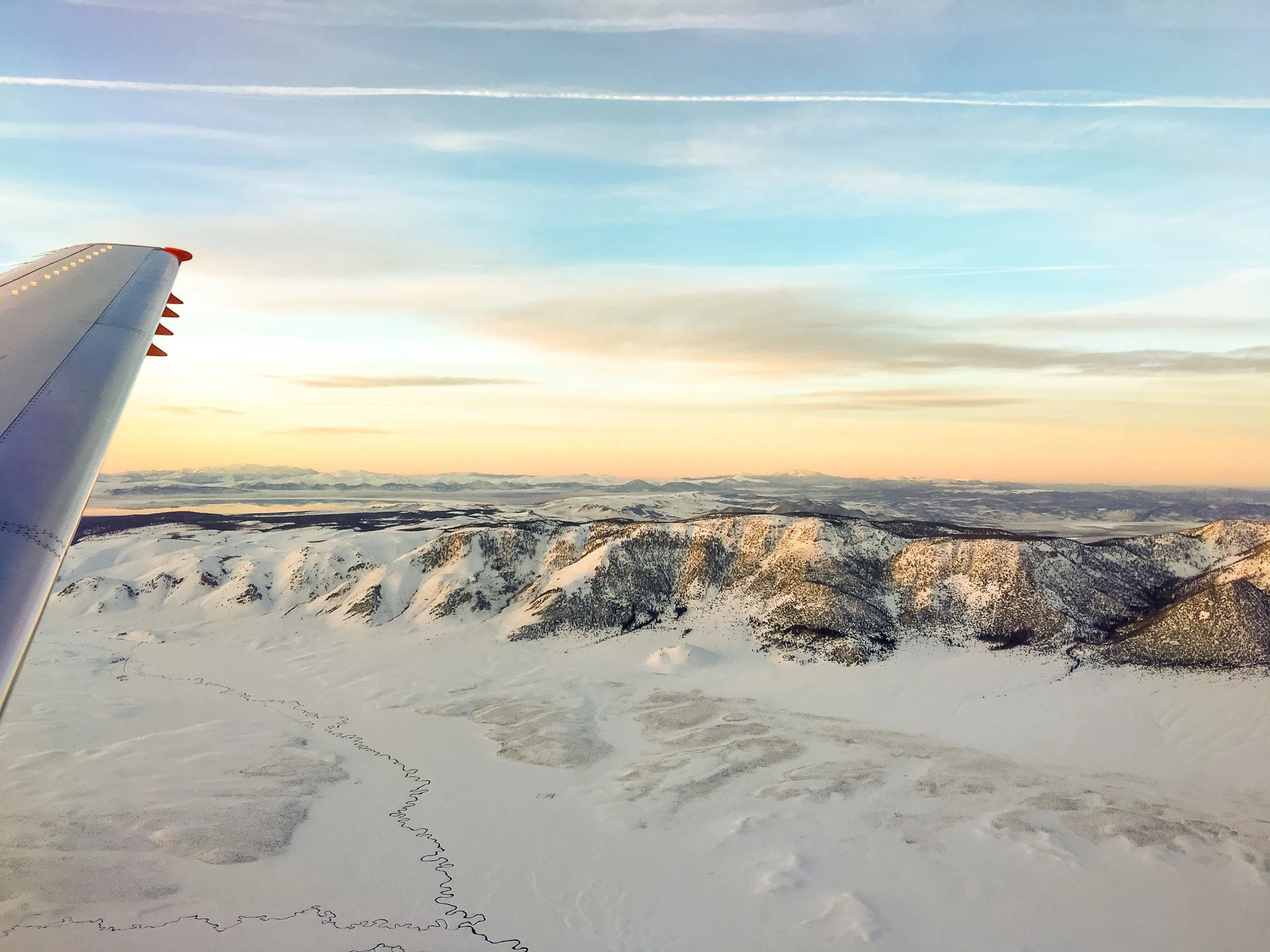 Sunset over Mammoth as seen from a JetSuiteX flight.