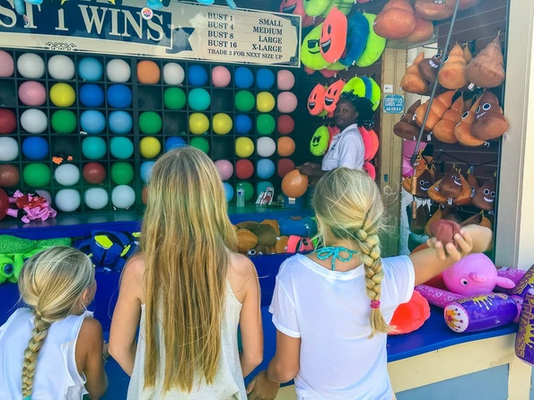 Play carnival games at Belmont Park in San Diego.