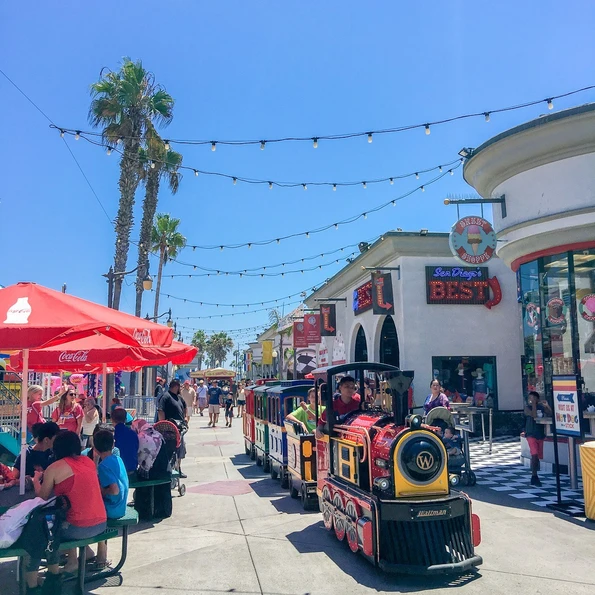 Belmont Express train rides through the beachfront amusement park