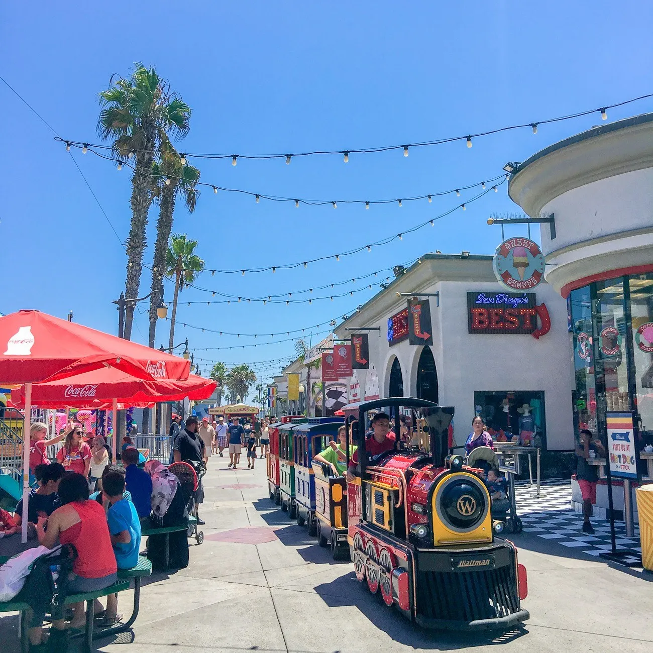 Belmont Express train rides through the beachfront amusement park