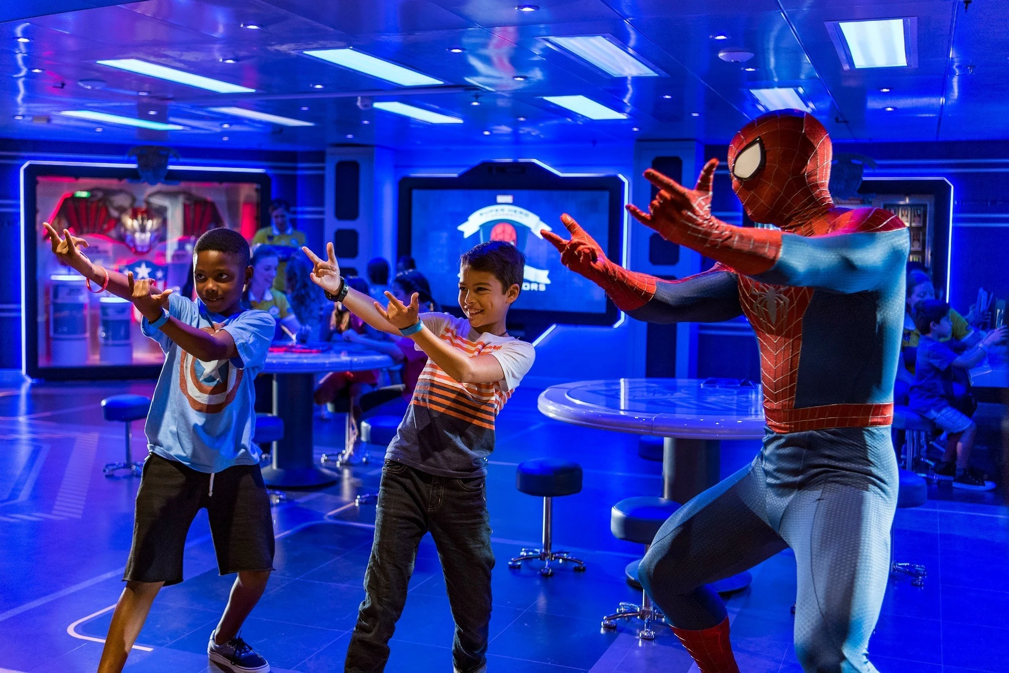 On the Disney Wonder, young guests get a special visit from Spider-Man while training at the Marvel Super Hero Academy in Disney's Oceaneer Club