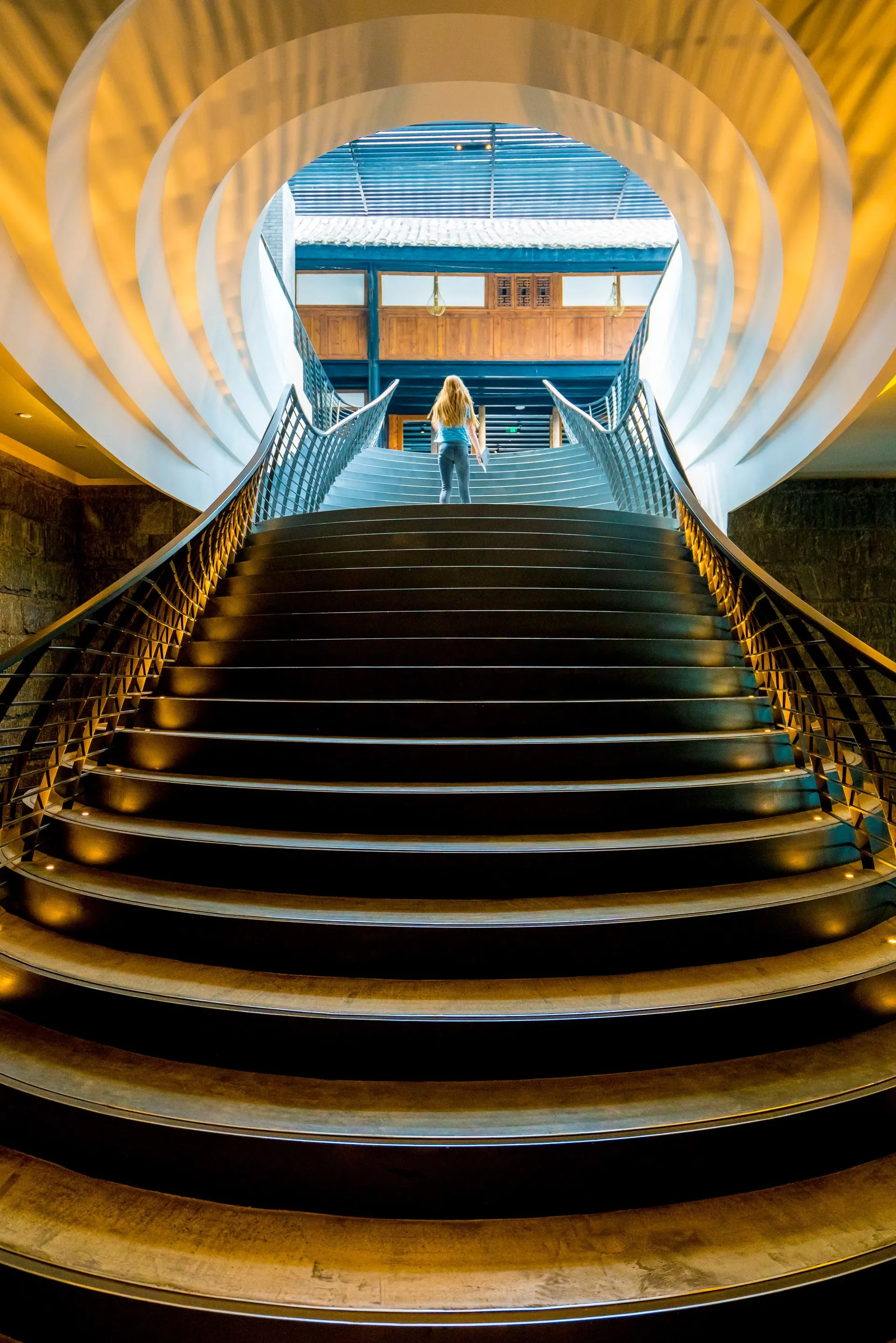 The stunning staircase at The Temple House, a luxury hotel in Chengdu.