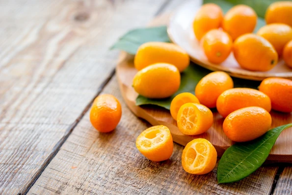 Kumquats are auspicious Asian fruits used as decor for Chinese New Year.