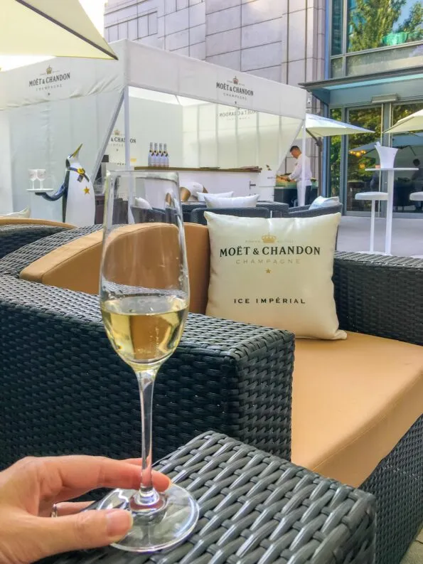 A glass of Moet Chandon on the patio of The Ritz-Carlton, Beijing