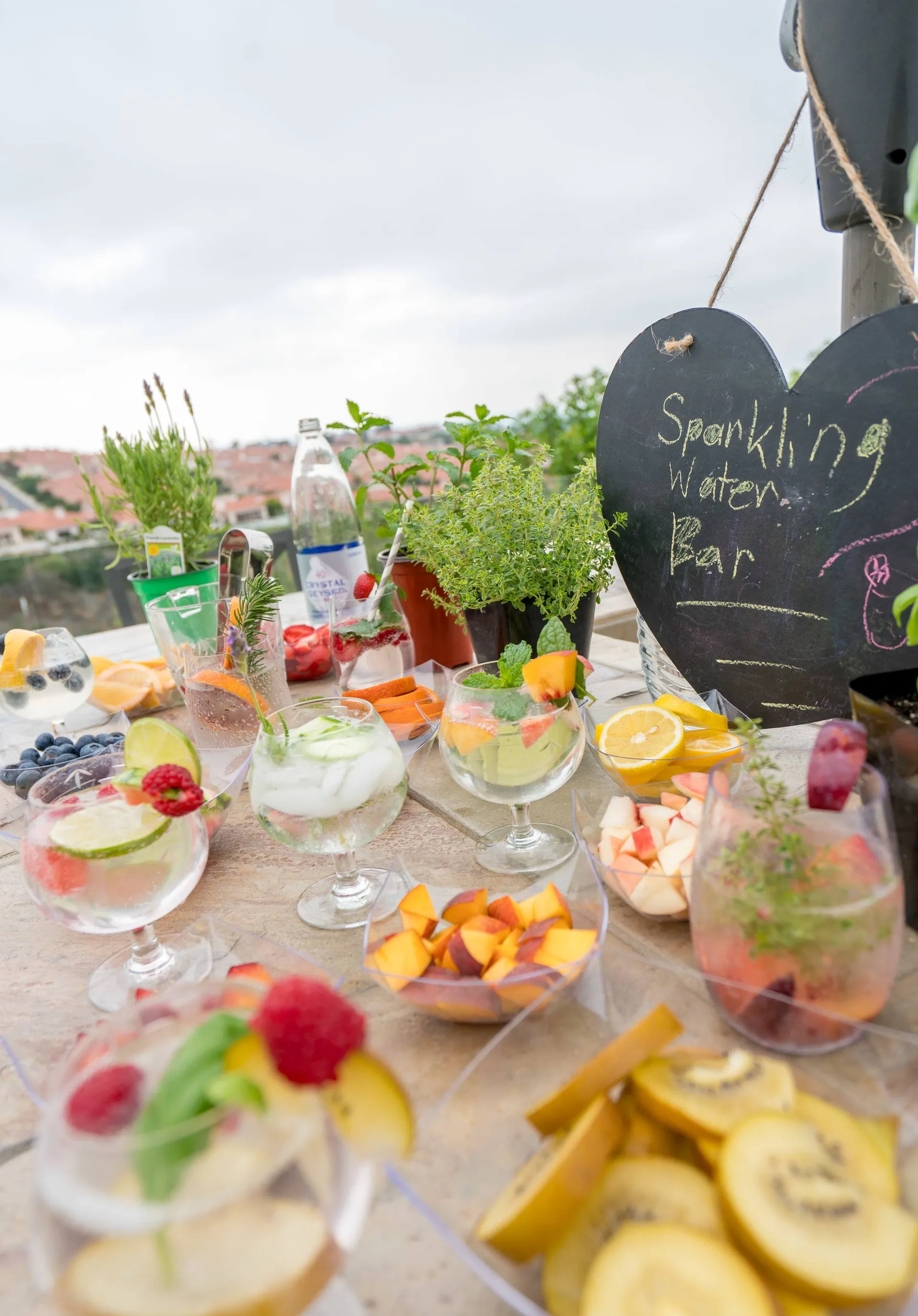 Party ideas: Make a sparkling water bar with fruit and herbs.