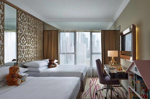 Family room with teddy bears and books at Dorsett Wan Chai.
