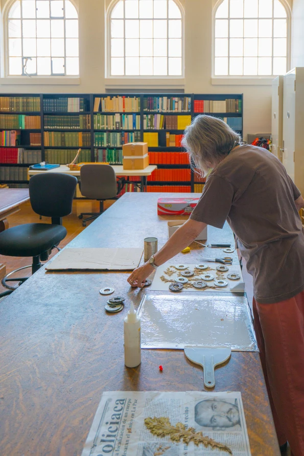 A volunteer catalogs plants at the San Diego Natural History Museum.