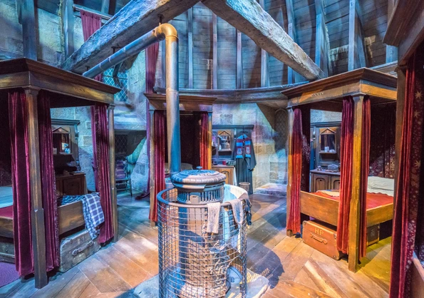 The Gryffindor boys' bedroom at the Warner Bros. Studios Tour London.