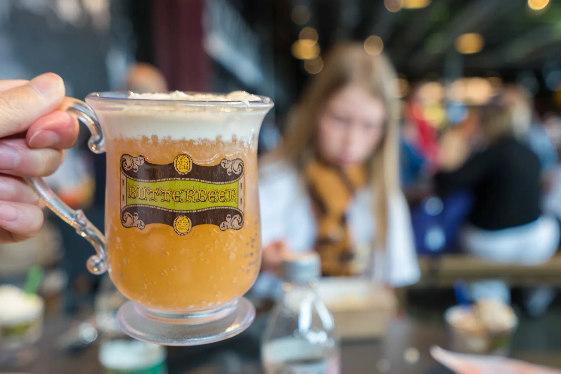 Butterbeer sold in a souvenir cup at Warner Bros. Studio Tour London.