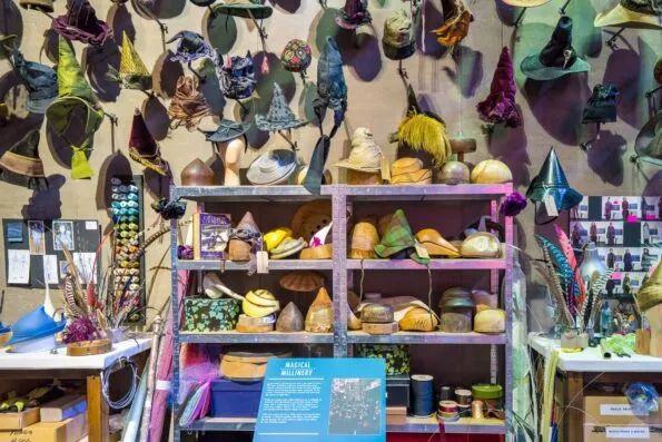 Harry Potter costumes and props in the millinery section of Warner Bros. Studio Tour London.