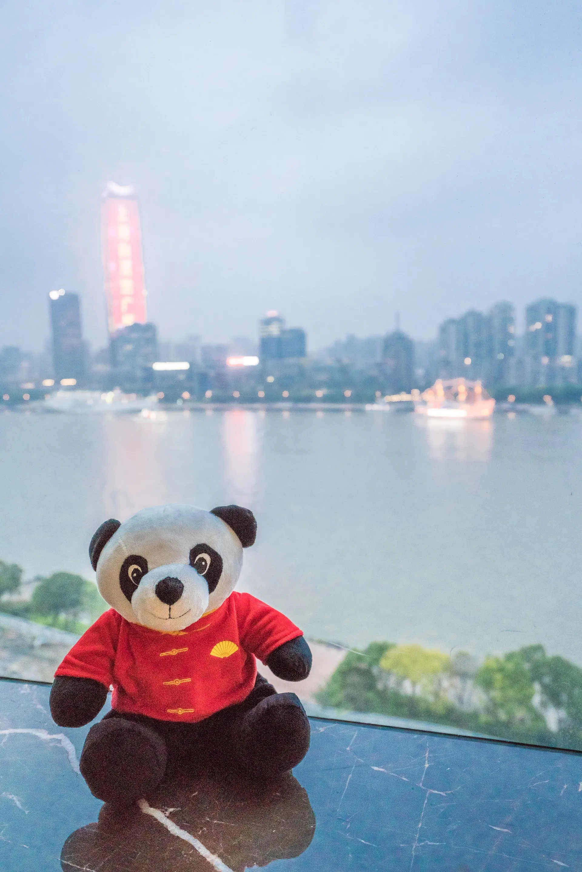 Momo the Panda and the view from Mandarin Oriental Pudong, Shanghai.