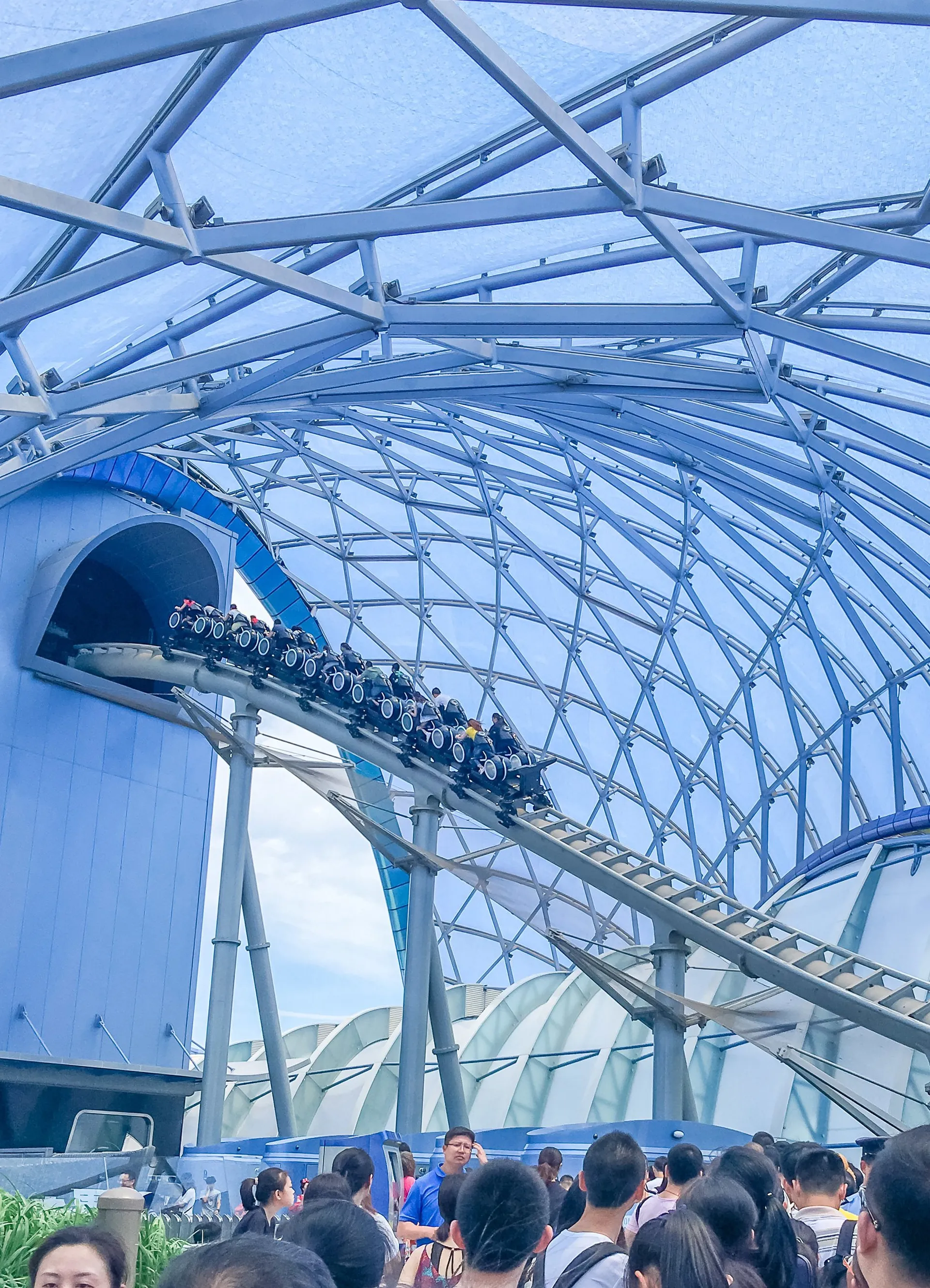 A closer view of riders on TRON in Shanghai Disneyland's Tomorrowland.