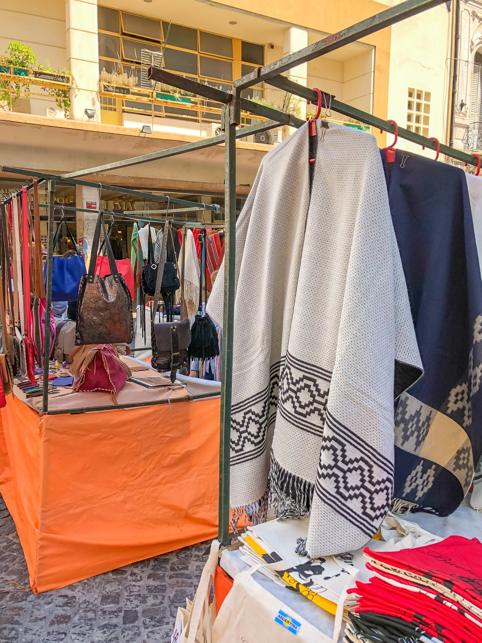 Leather goods and ponchos at the San Telmo Fair in Buenos Aires.