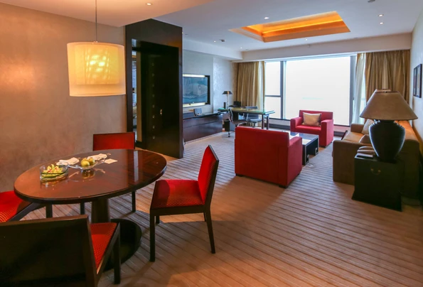 The living room in a Harbour View Suite at Four Seasons Hotel Hong Kong.