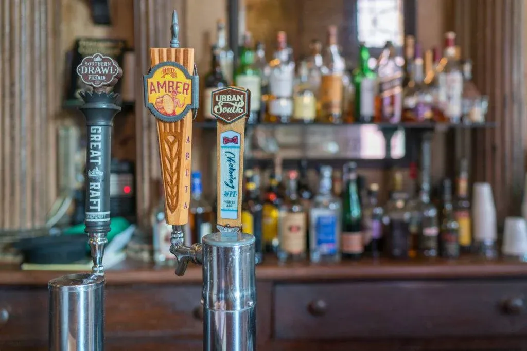 Taps on the oldest standing bar in New Orleans at Tujague's.