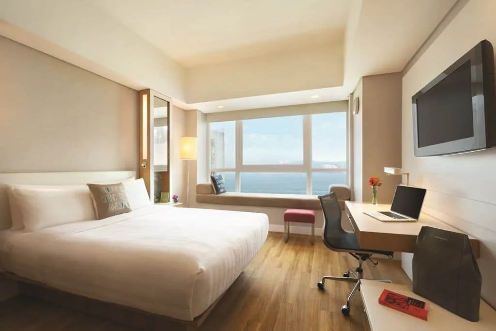 A Club Harbour View Room at Hotel Jen Hong Kong