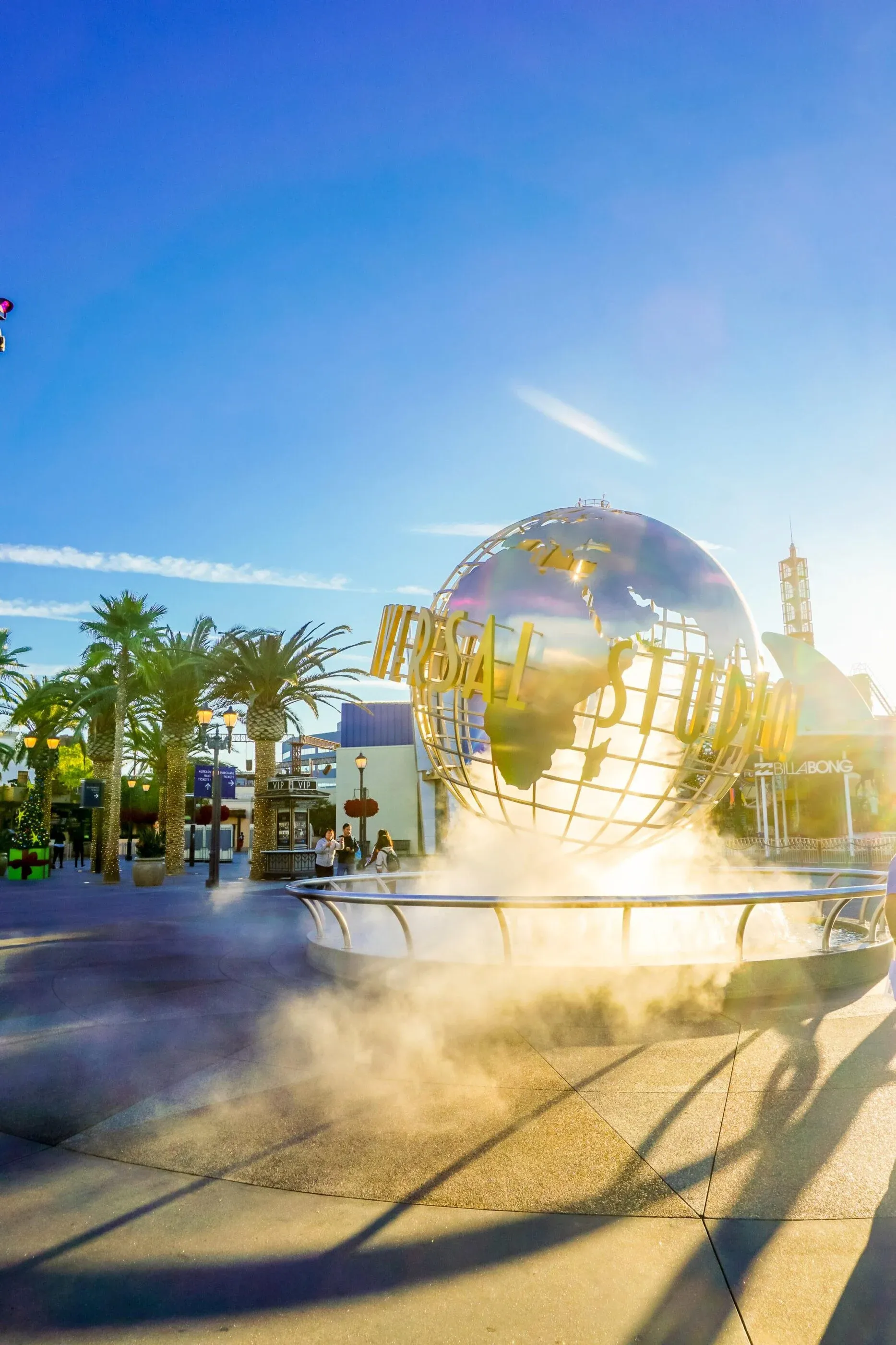 The Universal Studios Hollywood globe spins in the morning light.