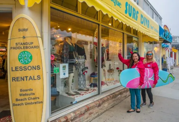 Izzy and Coco in front of the Surf Diva boutique in La Jolla Shores.