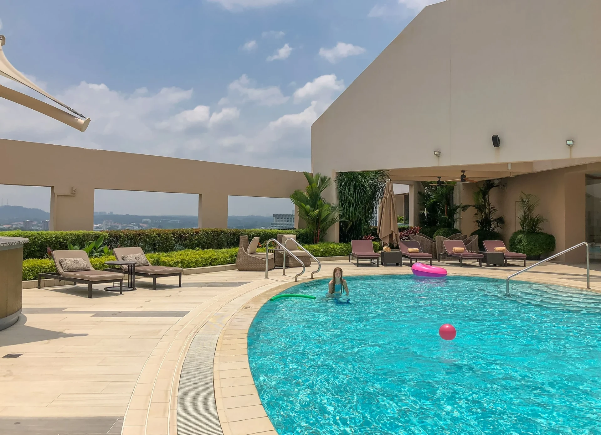 My daughter swims in the family pool