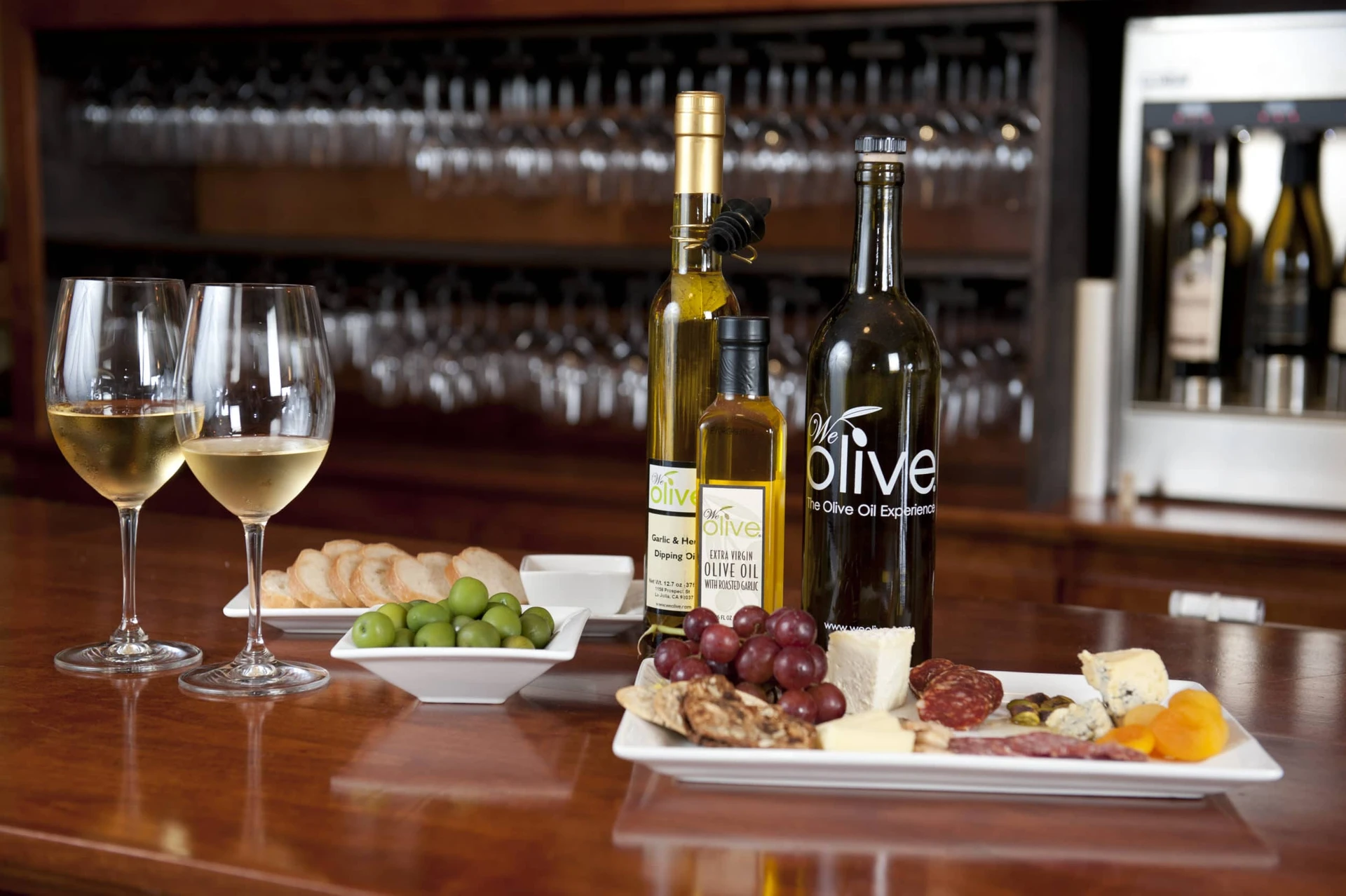 We Olive is great for La Jolla shopping for culinary gifts but the happy hour charcuterie plate and wine pictured here is another reason to go.