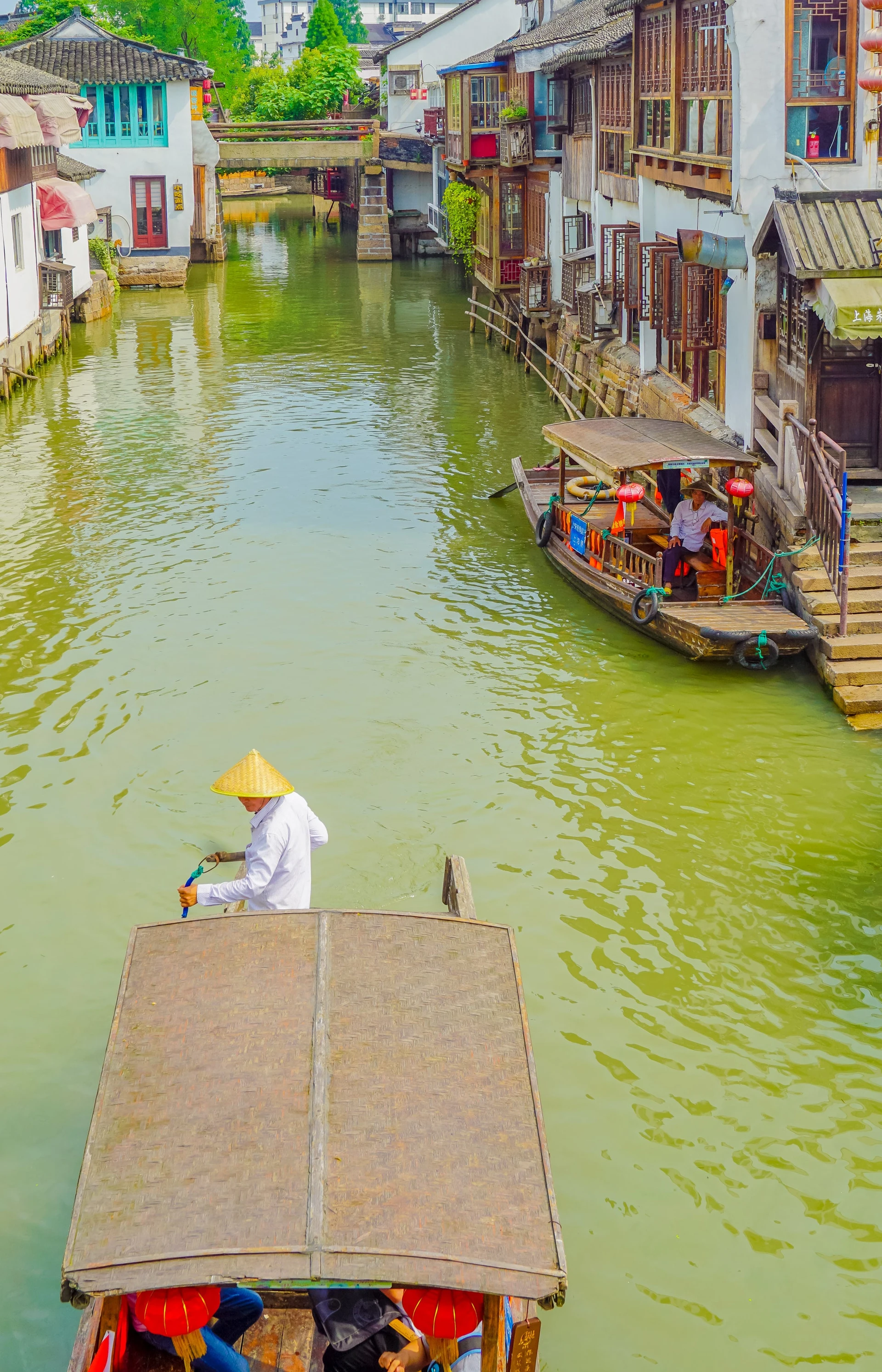 Take a boat ride at Zhujiajiao water town outside of Shanghai